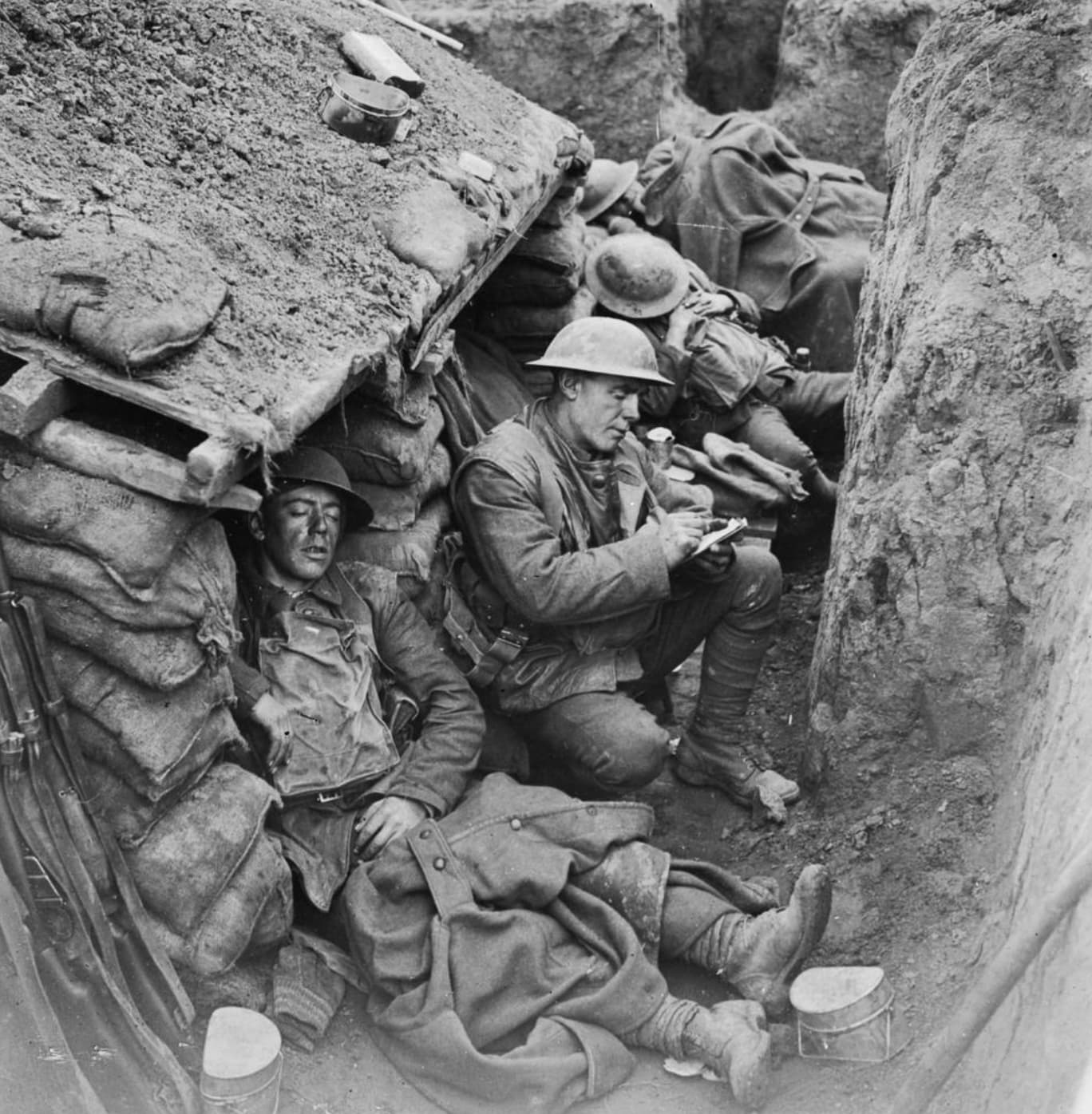 soldiers sleeping and writing letters